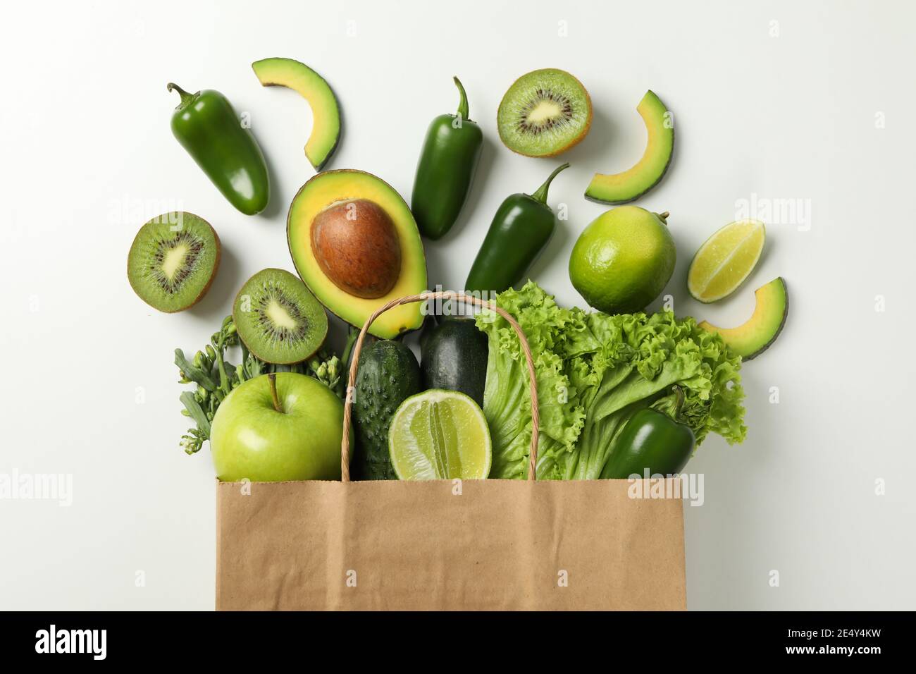 Paper bag with vegetables and fruits on white background Stock Photo ...