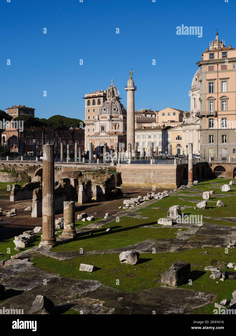 Rome. Italy. Remains of the Forum of Trajan (Foro di Traiano), and the Column of Trajan (Colonna Traiana, AD 113). Stock Photo