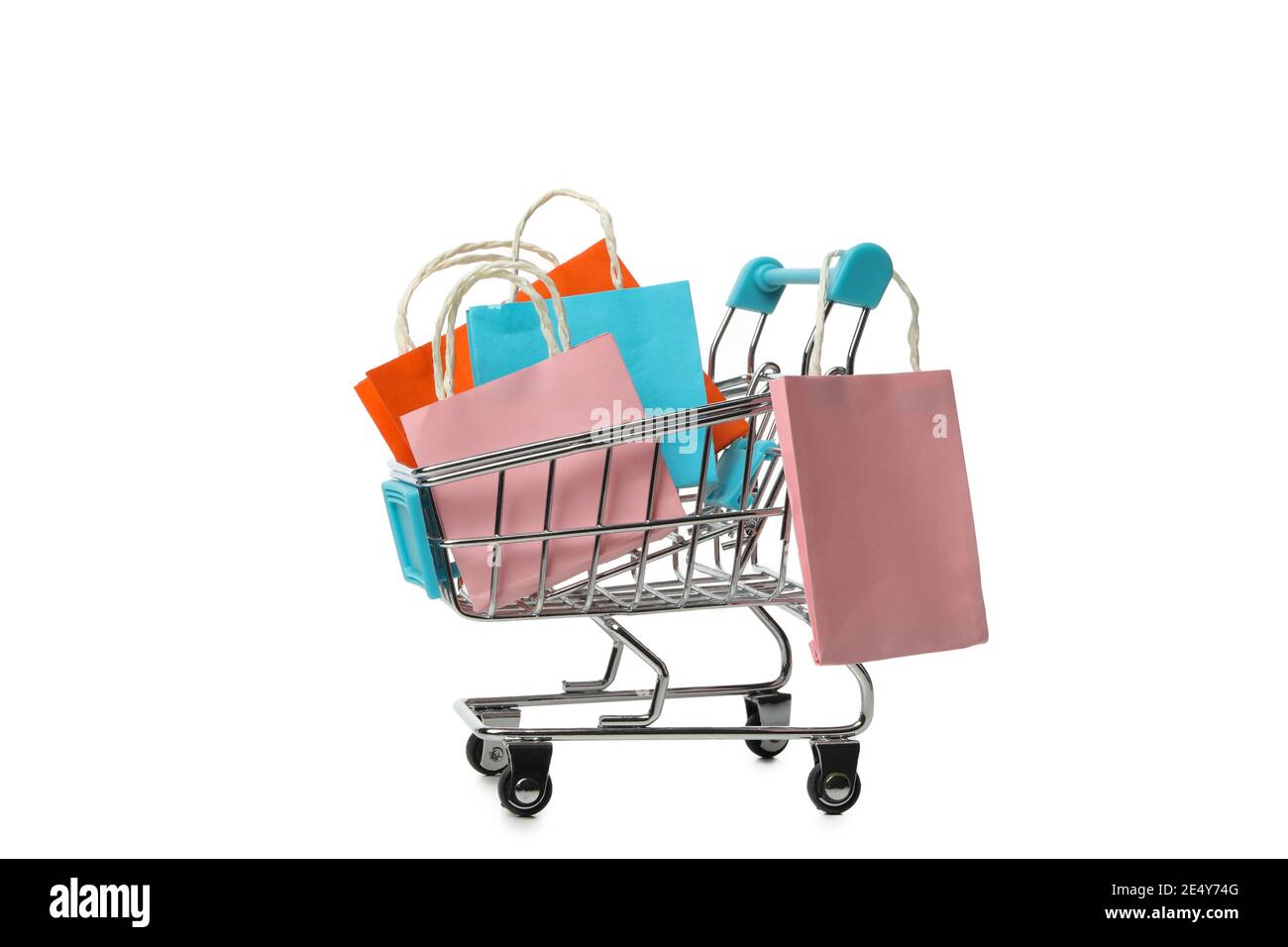 Shop cart with paper bags isolated on white background Stock Photo
