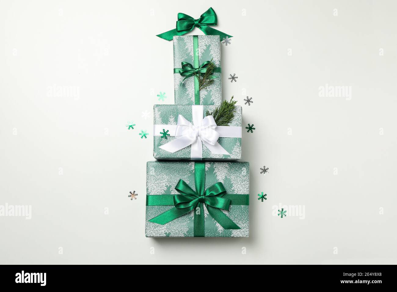 Christmas tree made of gift boxes on white background Stock Photo - Alamy