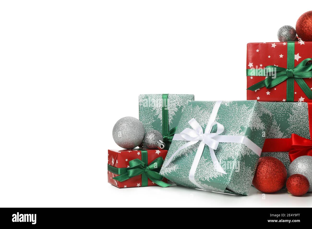 Gift boxes and baubles isolated on white background Stock Photo - Alamy