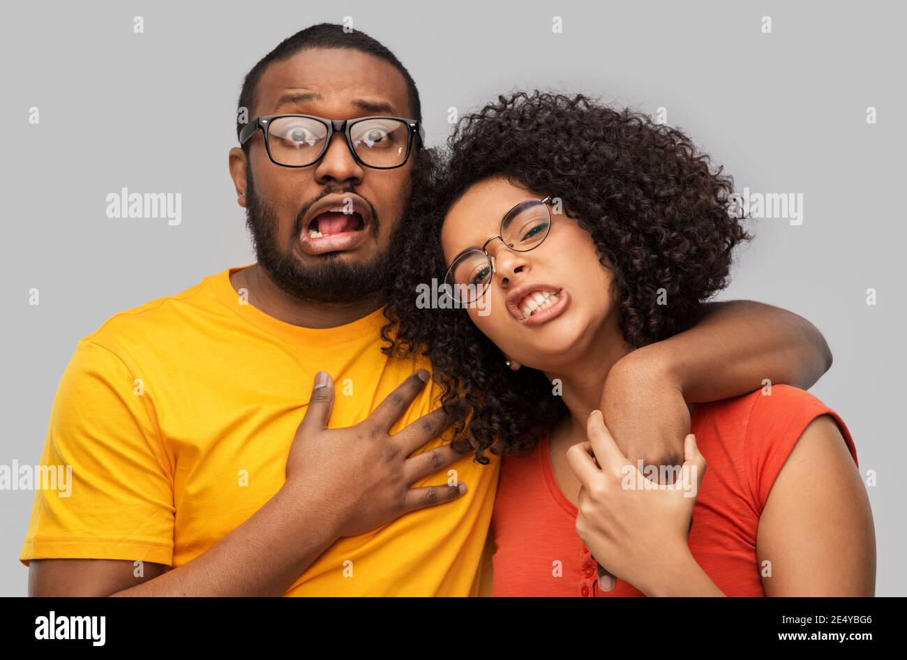 happy african american couple in glasses hugging Stock Photo - Alamy
