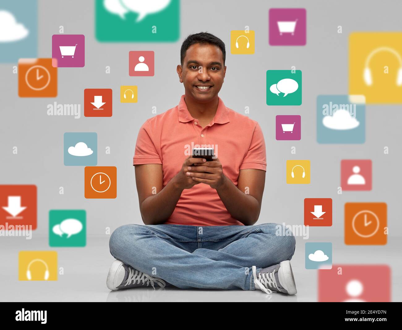 happy indian man using smartphone over app icons Stock Photo - Alamy