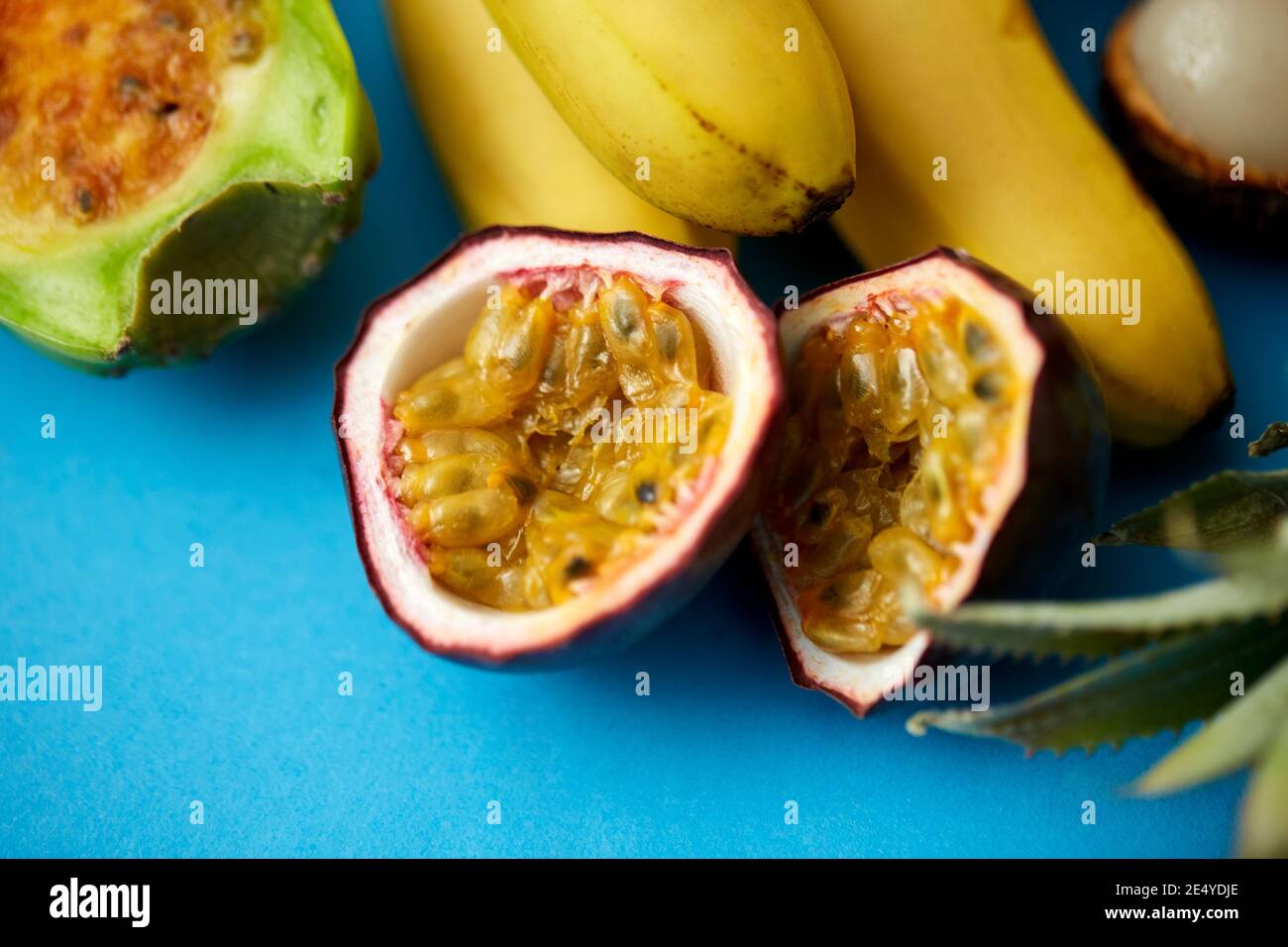 cut passion fruit with other exotic fruits Stock Photo Alamy
