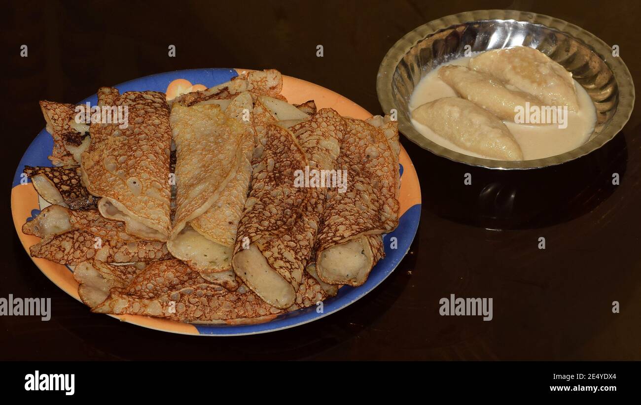Indian Bengali sweet dishes known as pithe or pitha which is made specially during Makar Sankranti festival. Patishapta and Puli Pitha Stock Photo