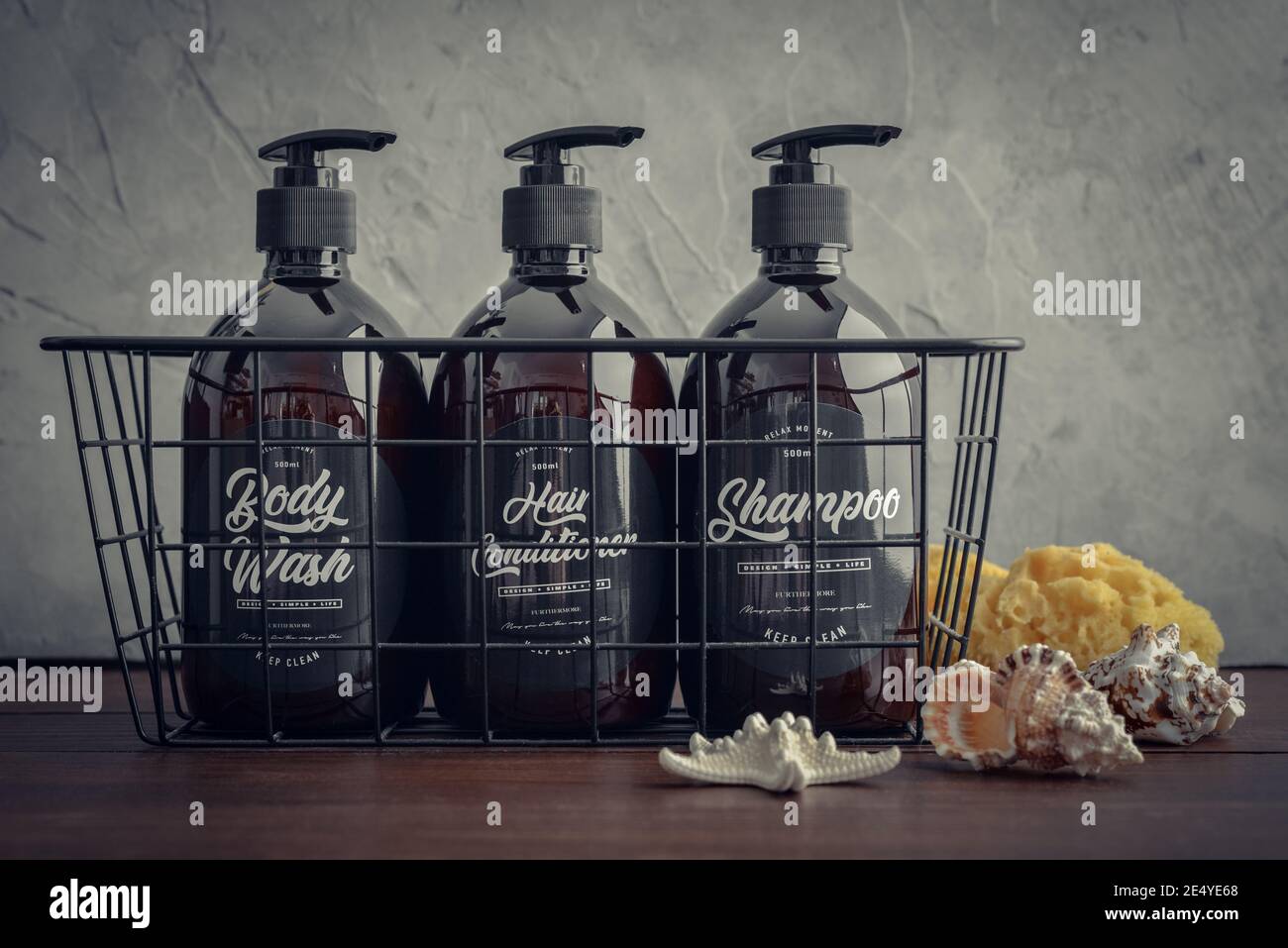 Set of refillable plastic brown bottles for shampoo, conditioner and