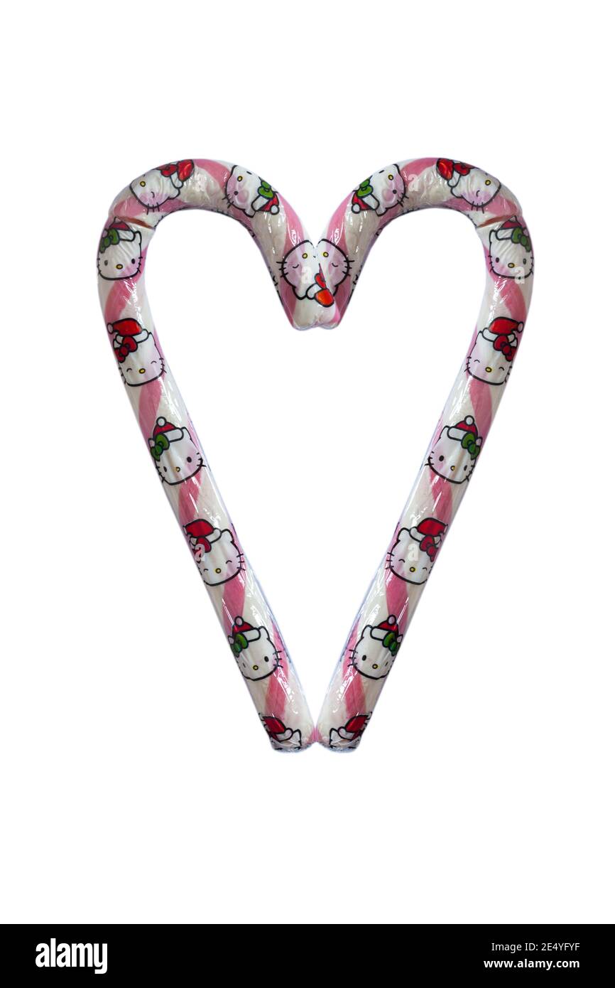 Hello Kitty Giant Candy Cane strawberry flavour isolated on white background - 2 candy canes arranged in heart shape Stock Photo