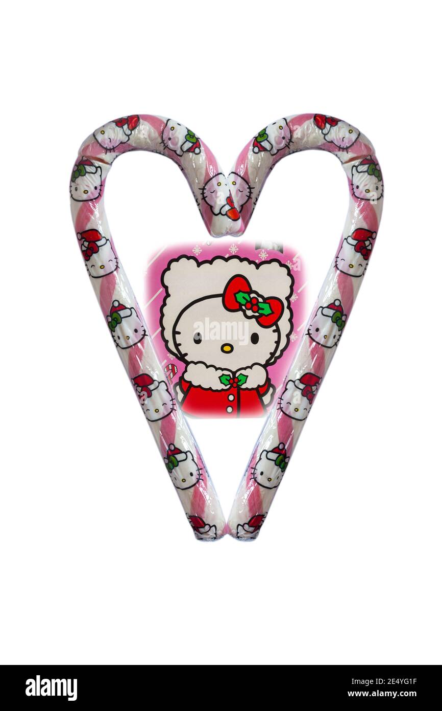 Hello Kitty Giant Candy Cane strawberry flavour isolated on white background - 2 candy canes arranged in heart shape with Hello Kitty in the middle Stock Photo