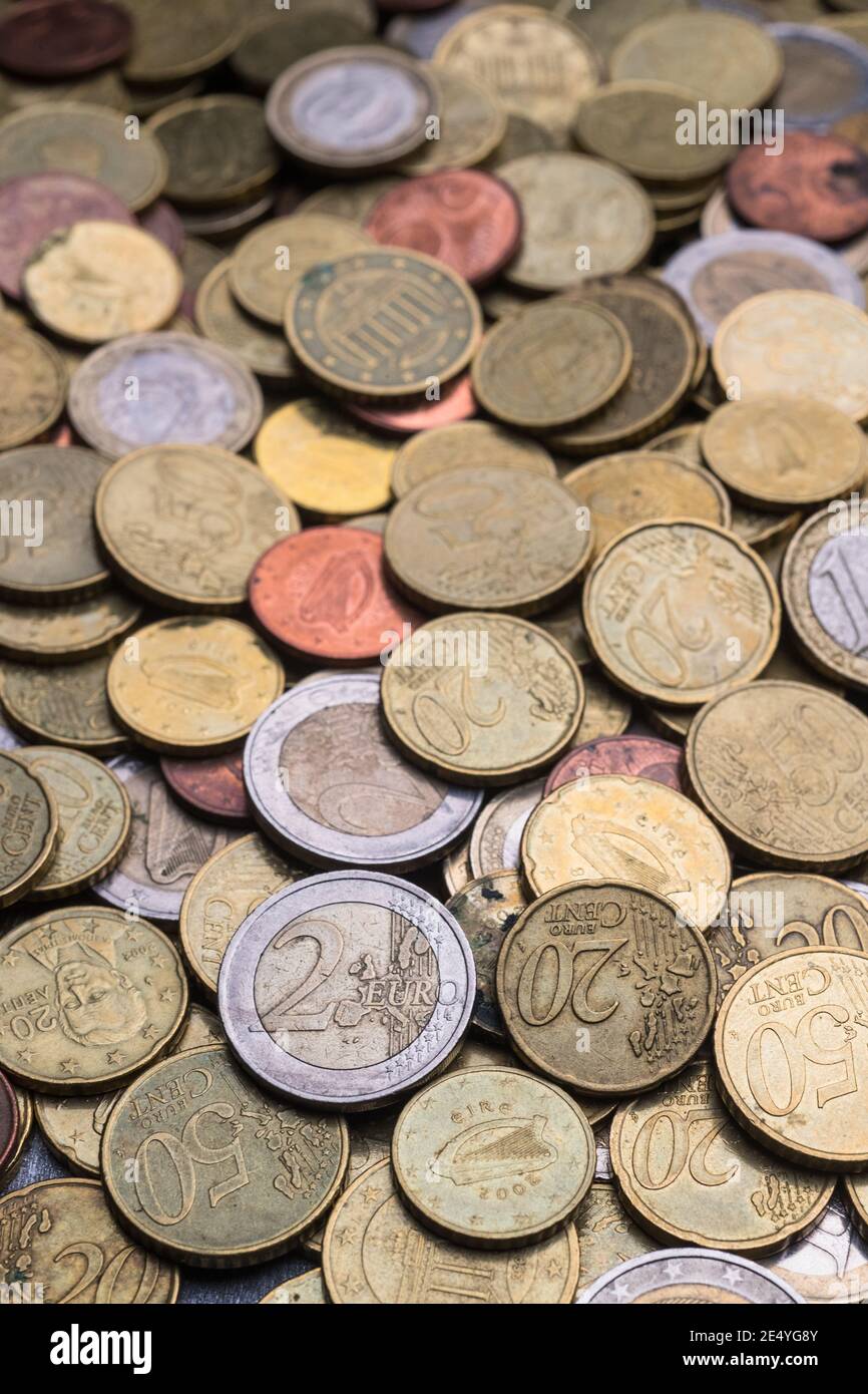 Pile of old dirty and used euro coins Stock Photo