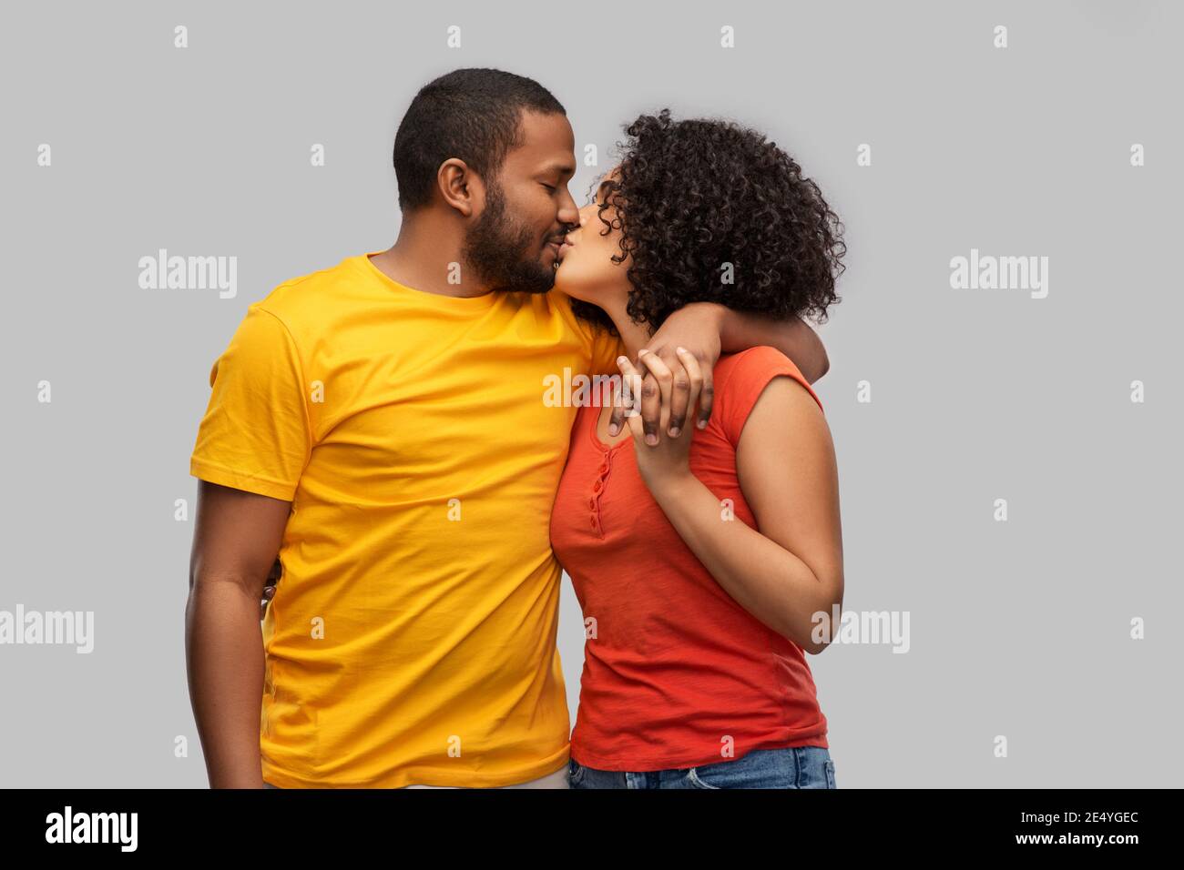 happy african american couple kissing Stock Photo