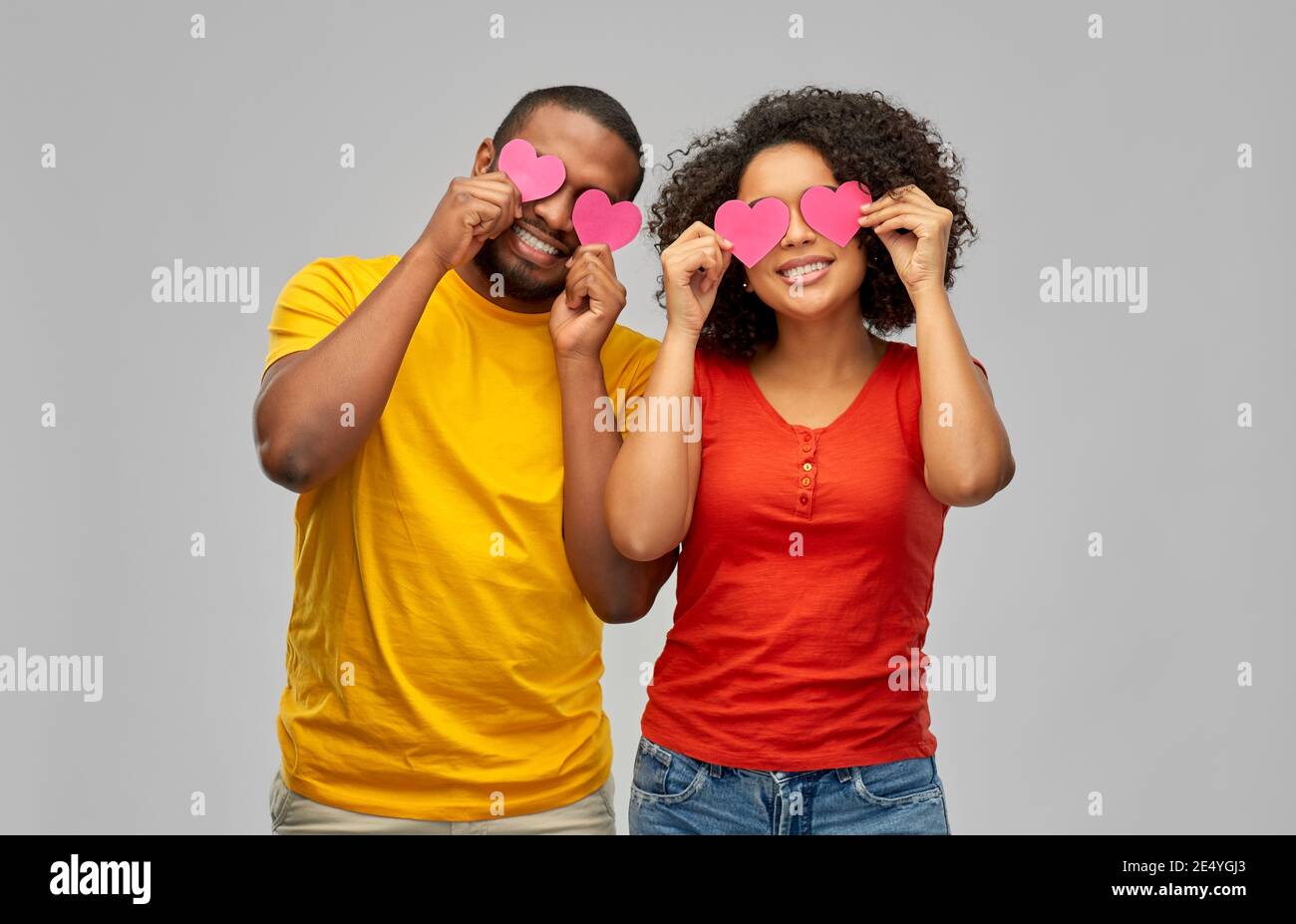 happy african american couple with hearts Stock Photo - Alamy