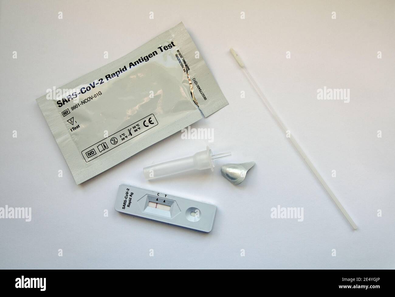 Basingstoke, UK - January 25, 2021:  Overhead view of a used swab test showing a negative result for COVID-19. Stock Photo
