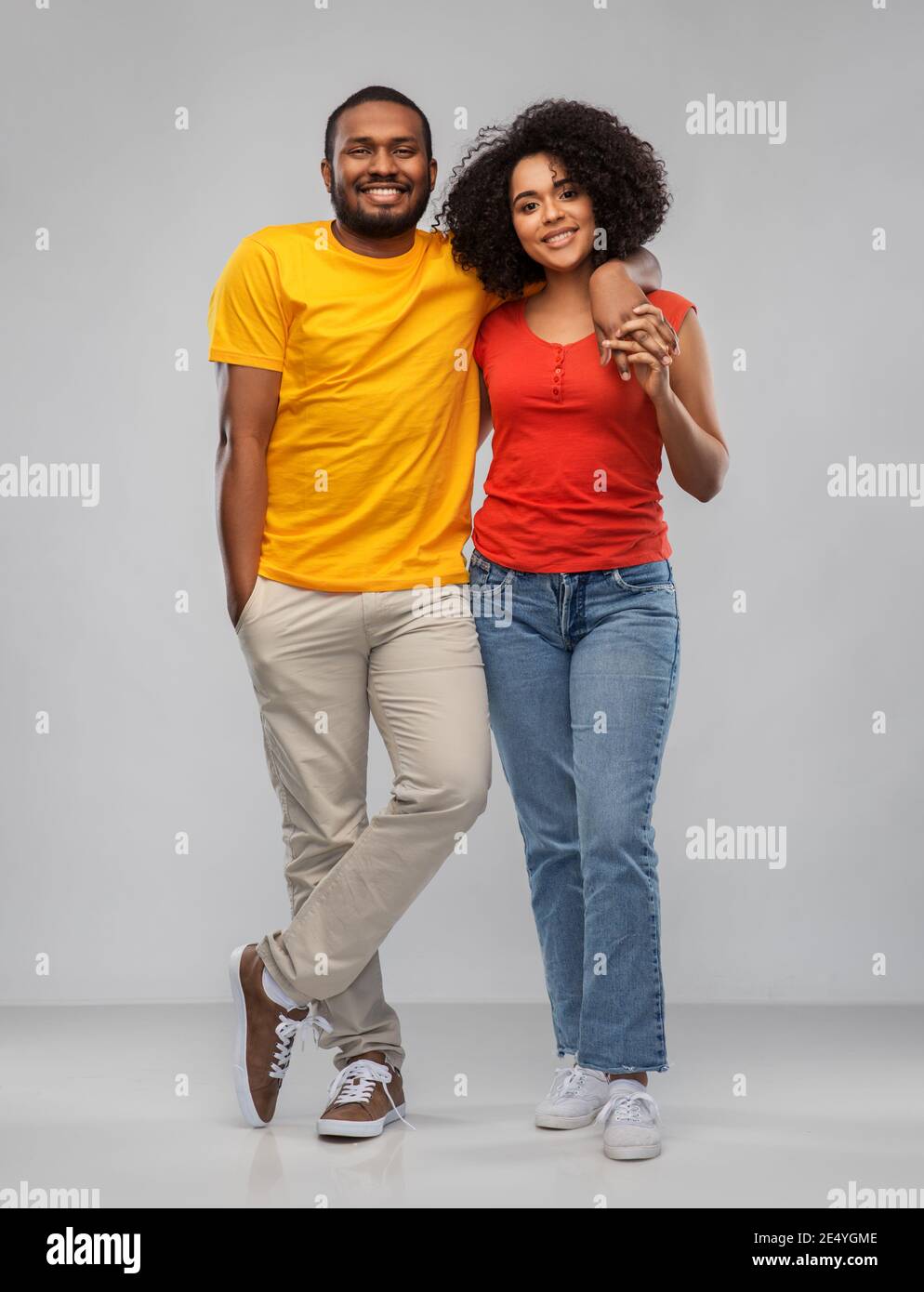 happy african american couple hugging Stock Photo - Alamy