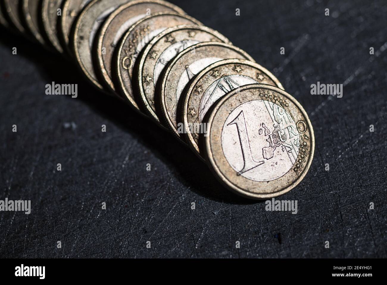 Pile of old and used one euro coins Stock Photo