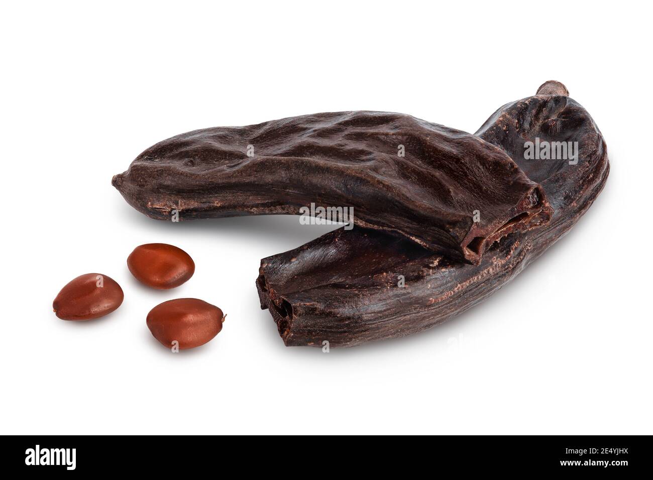 Ripe carob pods and bean isolated on white background with clipping