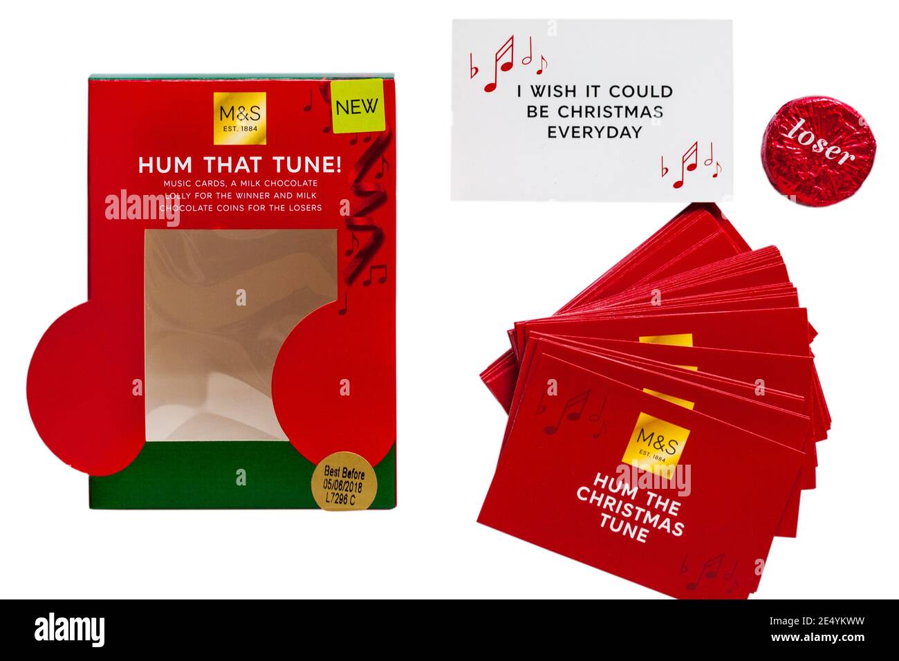 M&S Hum that Tune game with Hum the Christmas Tune cards removed from box set on white background - I wish it could be Christmas every day Stock Photo