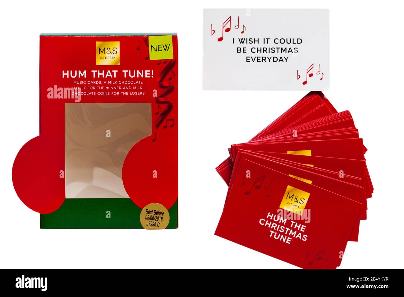 M&S Hum that Tune game with Hum the Christmas Tune cards removed from box set on white background - I wish it could be Christmas every day Stock Photo