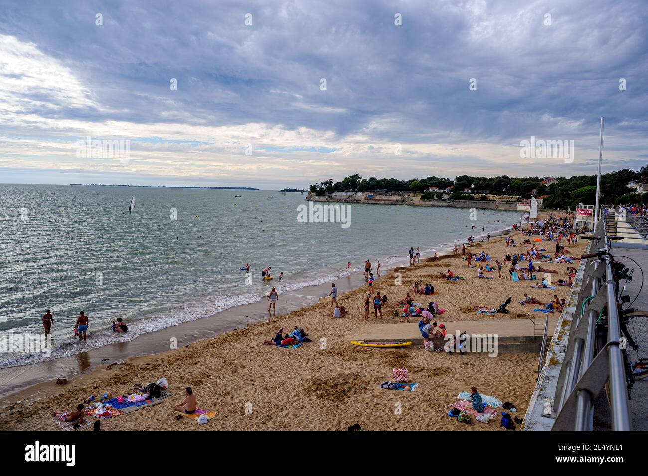 France. The beach of the coastal town of Fouras attracts swimmers on a beautiful sunny afternoon. Stock Photo