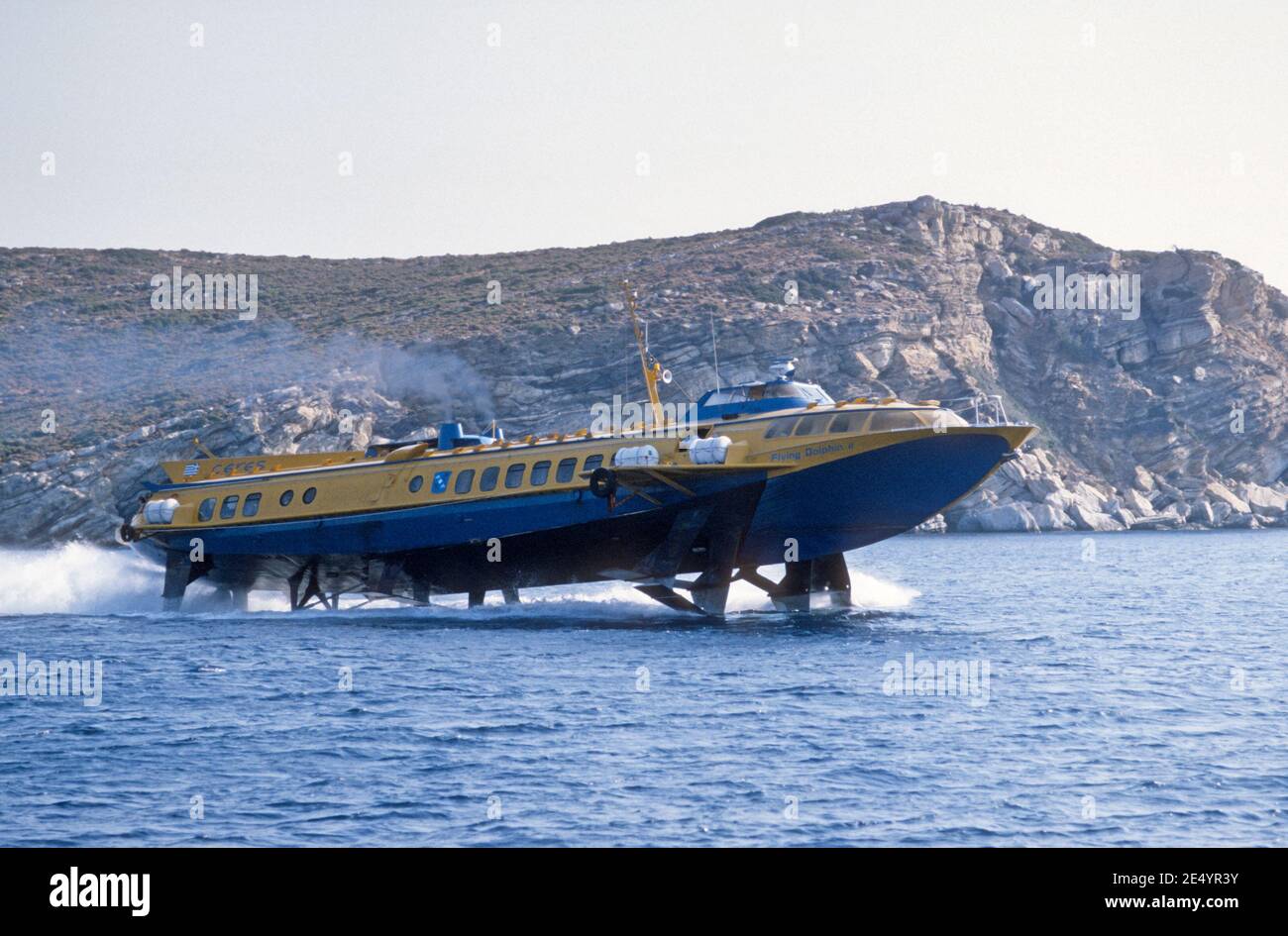 1986 Greece - The Flying Dolphin II  Aegean Flying Dolphins Ceres Flying Dolphins A high speed Hydrofoil operating between Piraeus-Aegina-Agistri-Poros-Hydra-Ermioni-Spetses-Porto Cheli ( Porto Heli) Piraeus to Porto Heli Ferry Greece,EU,Europe Stock Photo