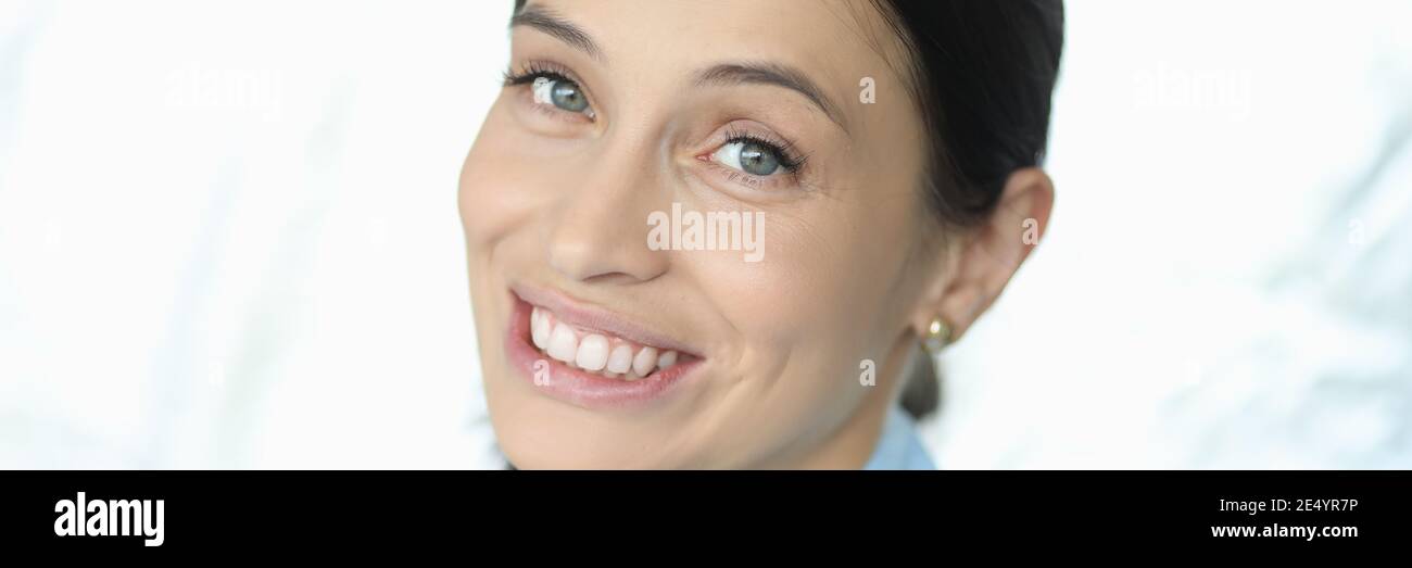 Cheerful beautiful lady posing while looking at camera Stock Photo - Alamy
