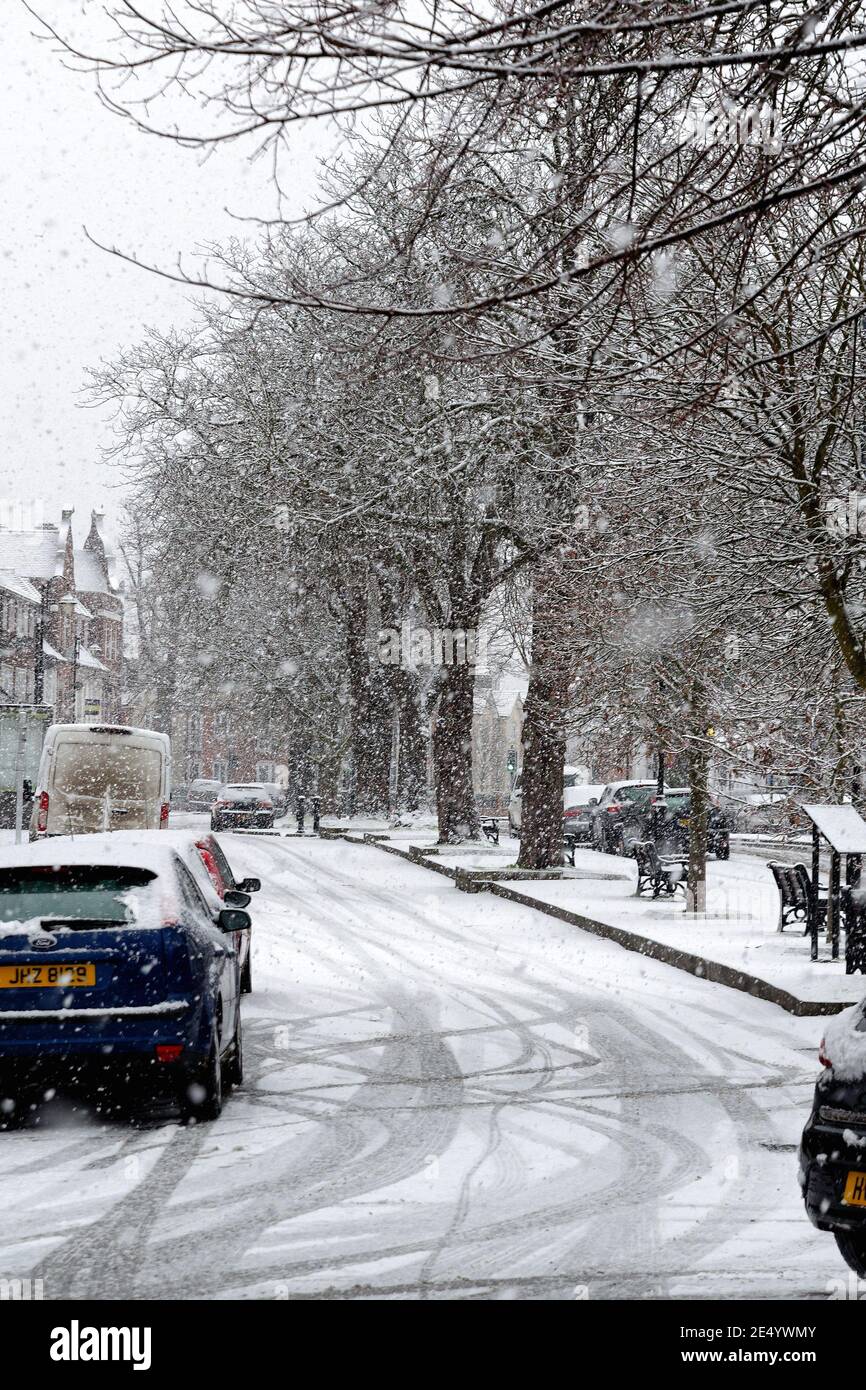 Heavy snowfall in a suburban high street, Shepperton Surrey England UK Stock Photo