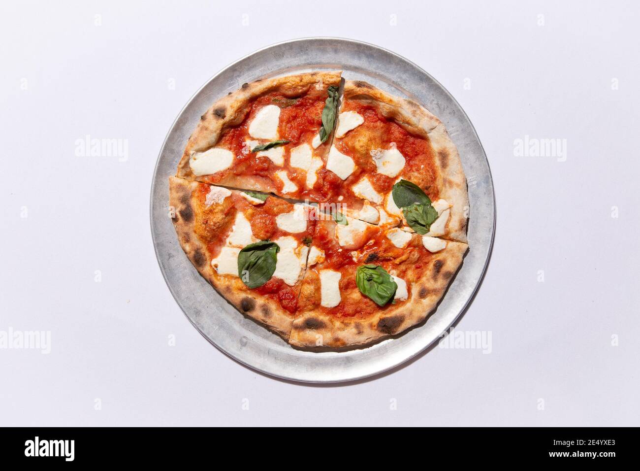 High Angle View of Brick Oven Margherita Pizza Stock Photo