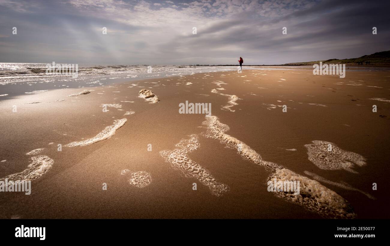 woman standing by the sea at Blackwaterfoot Stock Photo - Alamy