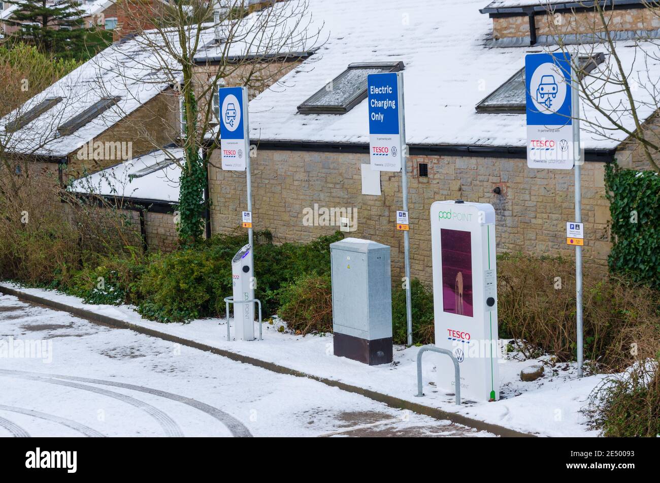 Holywell, Flintshire; UK: Jan 25, 2021: The Holywell branch of a Tesco supermarket has electric vehicle charging points in the car park. Stock Photo