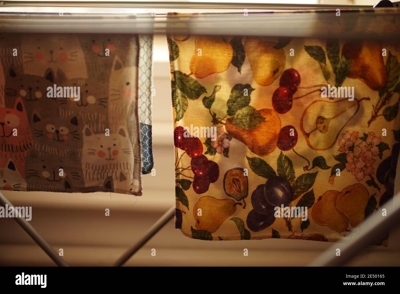 Folding clothes dryer with kitchen towels closeup Stock Photo Alamy