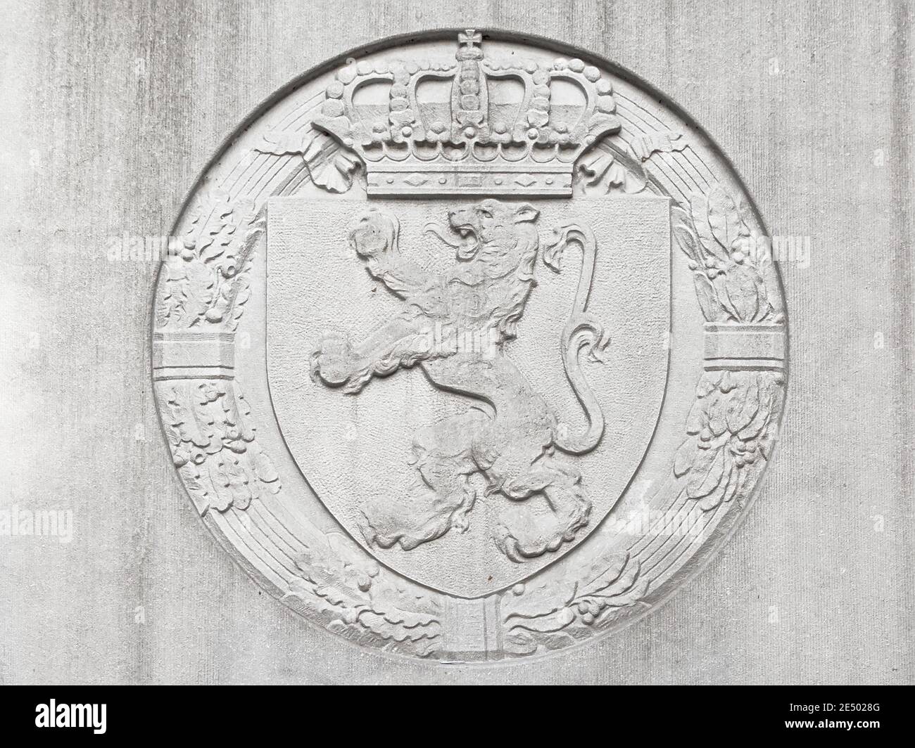 Bas relief stone carving of coat of arms of belgium, with lion, crown and laurels Stock Photo