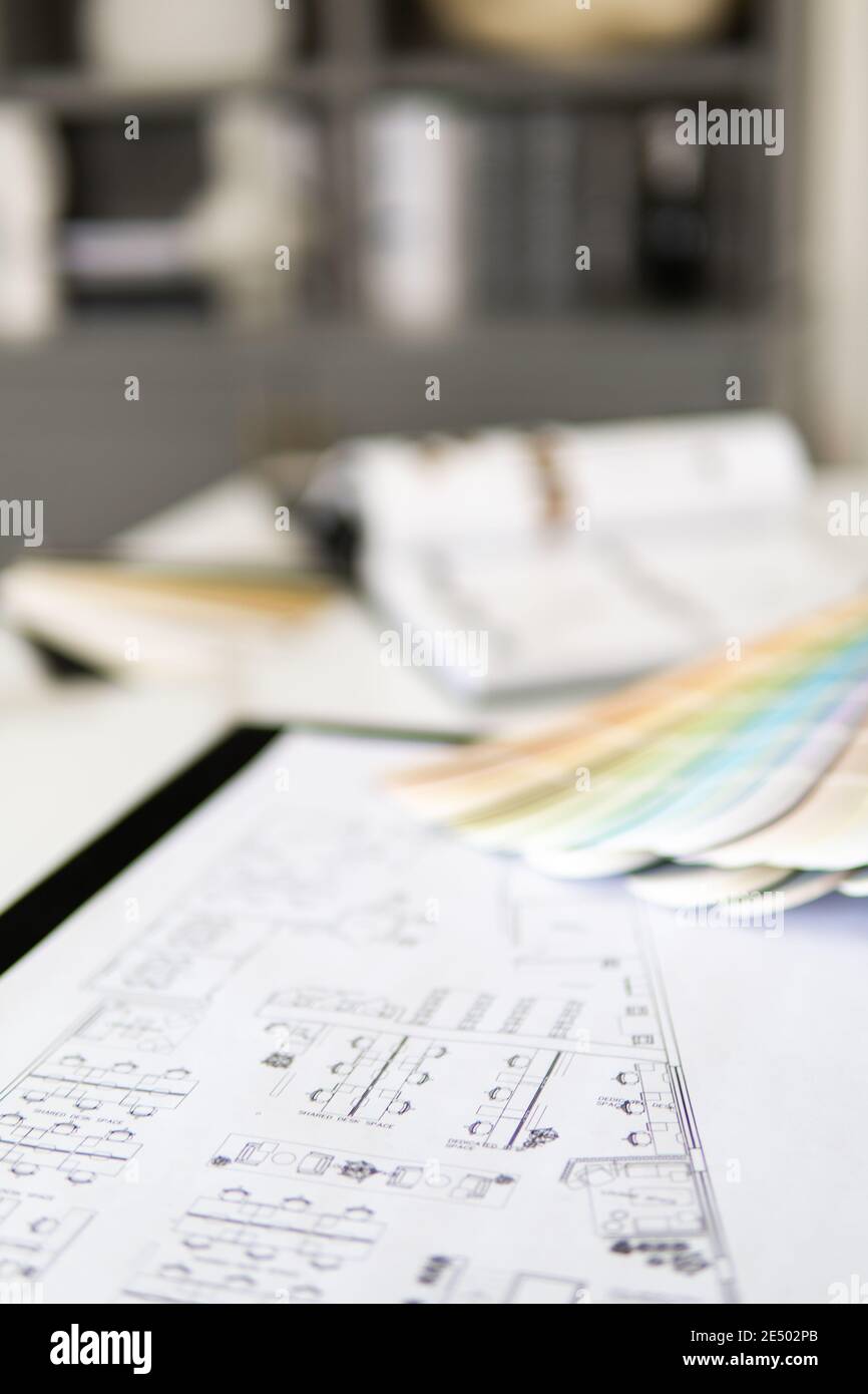Interior designer's working table, an architectural plan of the house ...