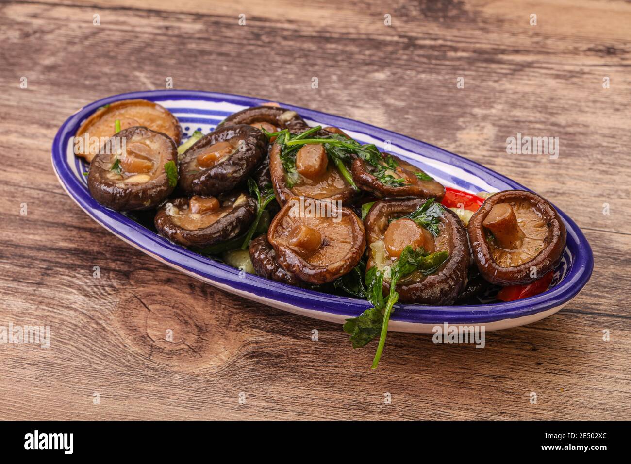 Marinated shiitake mushrooms with herbs and spices Stock Photo Alamy