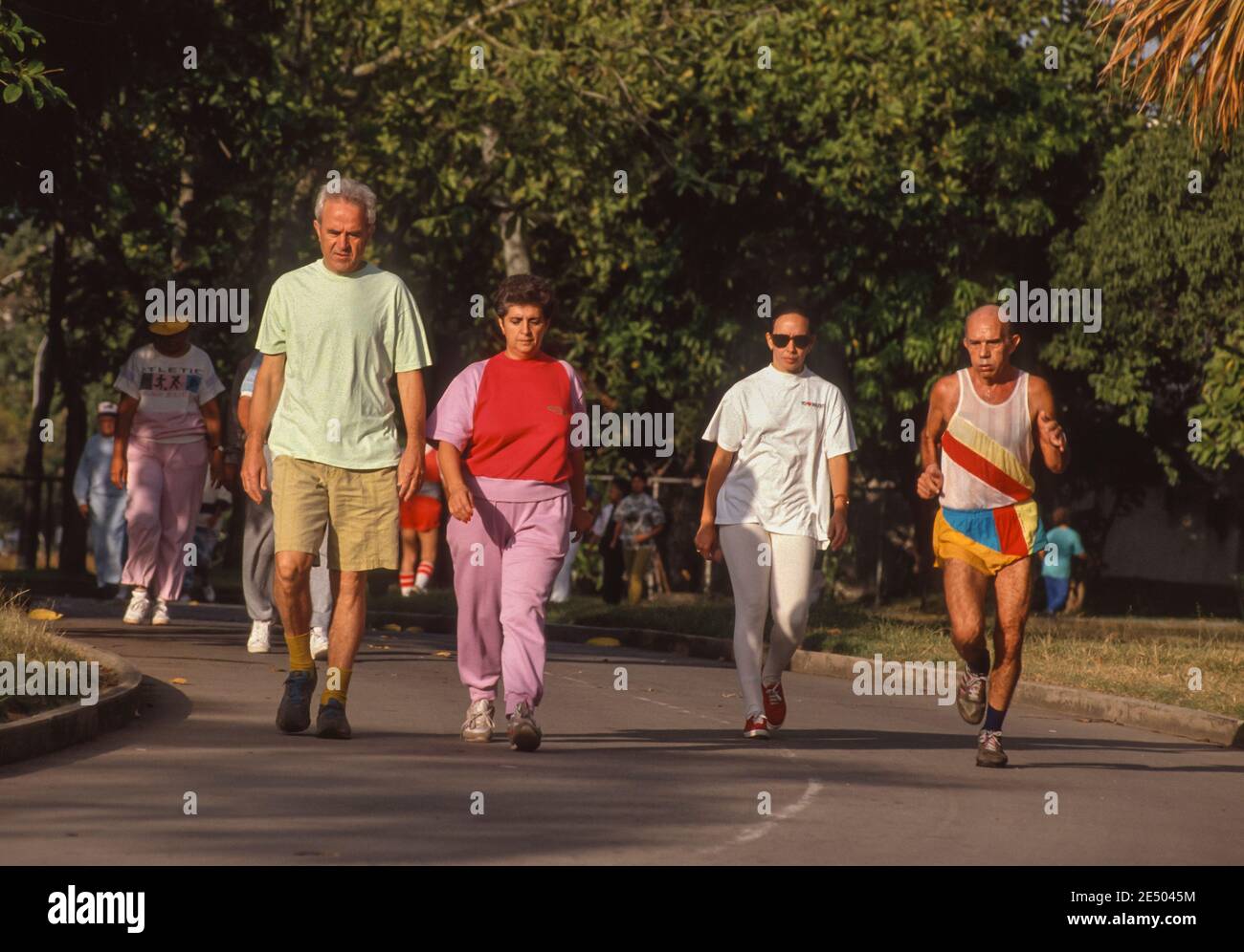 CARACAS, VENEZUELA, OCTOBER 1992 - People walking for exercise and jogging in Parque del Este. Stock Photo