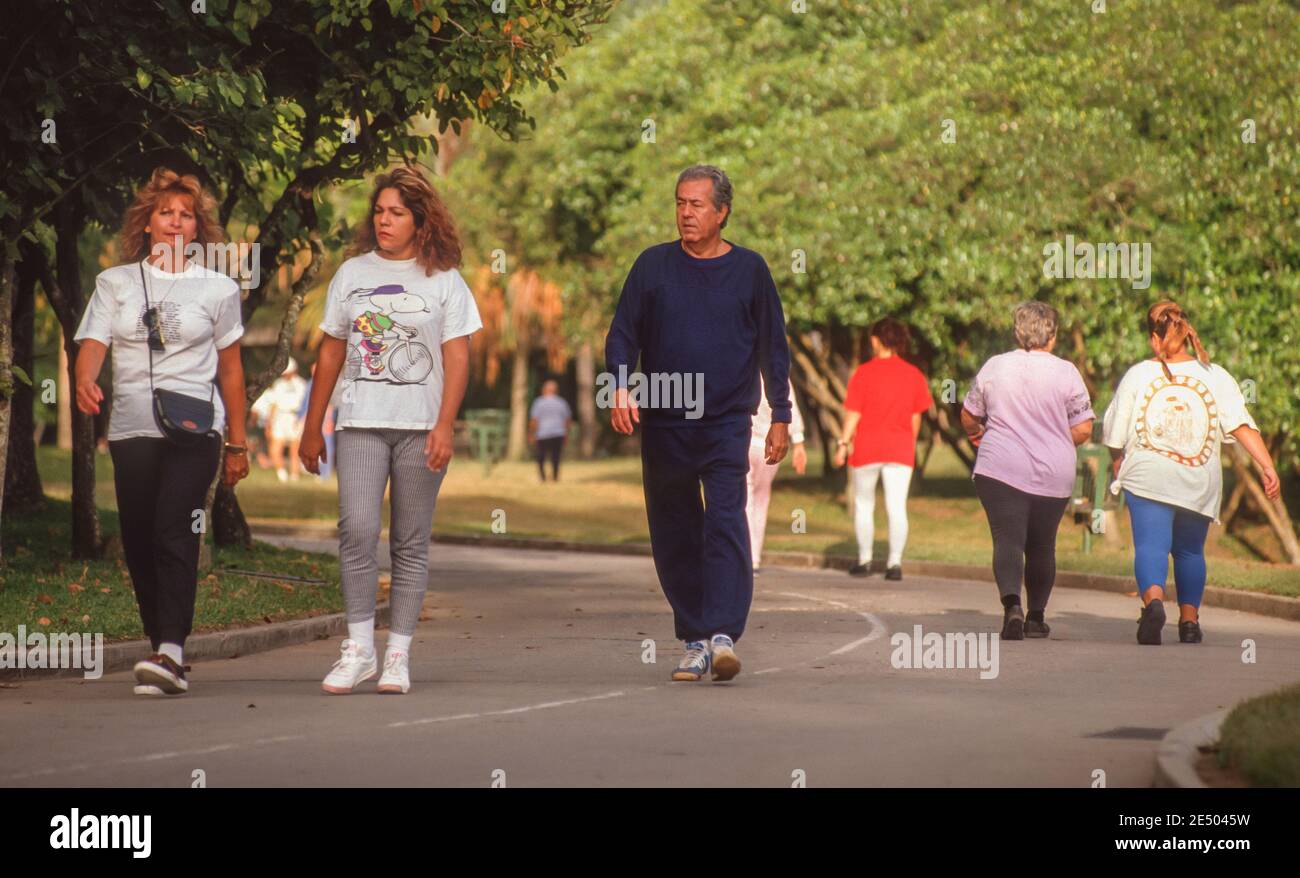 CARACAS, VENEZUELA, OCTOBER 1992 - People walking for exercise in Parque del Este. Stock Photo