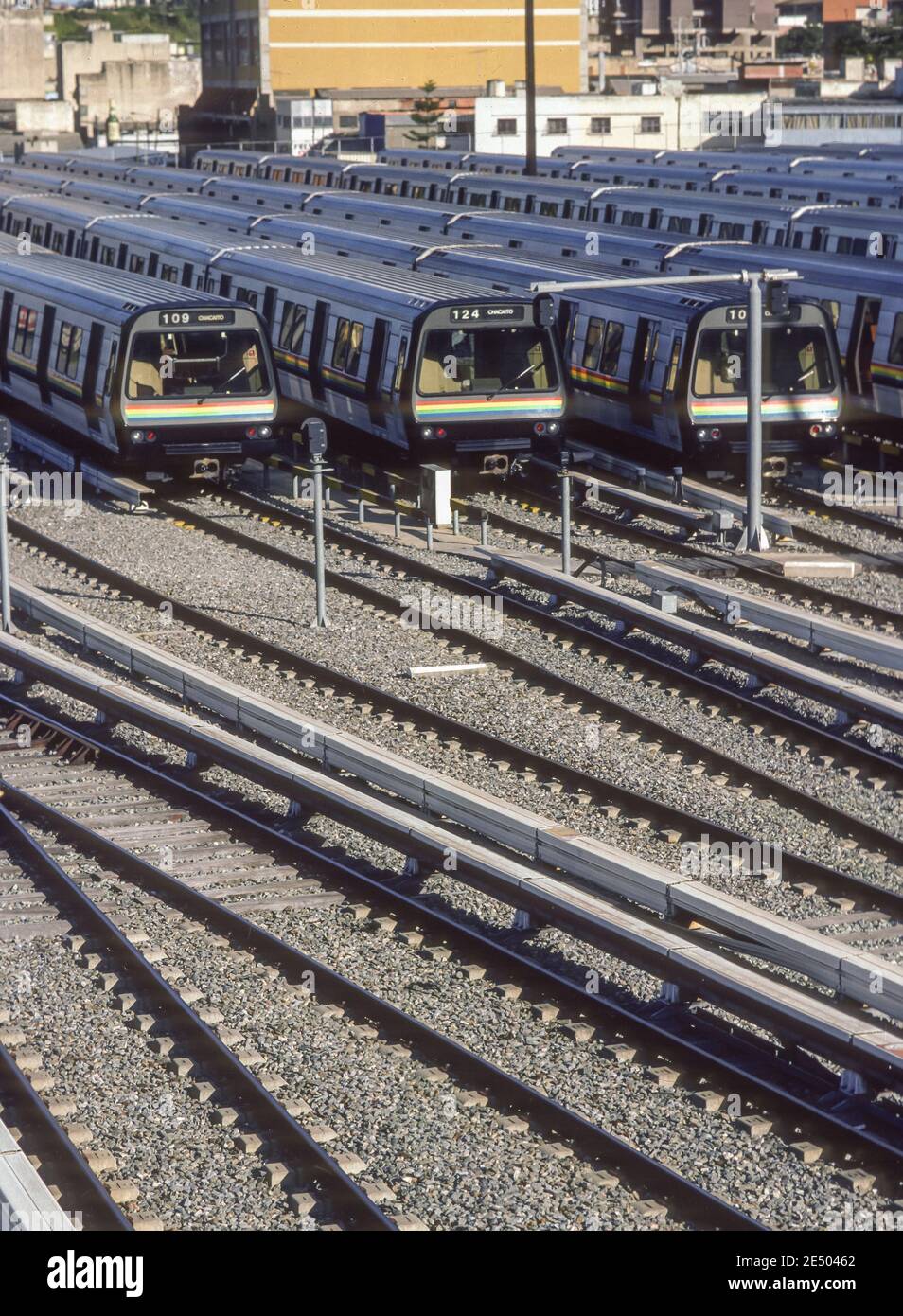 CARACAS, VENEZUELA, 1988 - Metro train cars parked in train yard. Stock Photo