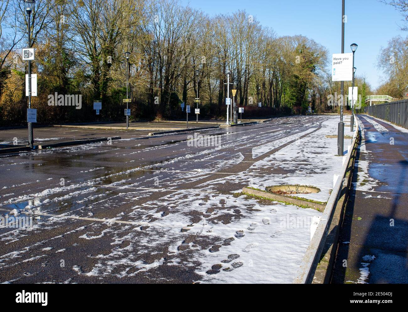 Windsor, Berkshire, UK. 25th Janaury, 2021. An empty icy commuter car park at Windsor & Eton Riverside station as many people continue to work from home during the Covid-19 lockdown. Credit: Maureen McLean/Alamy Live News Stock Photo