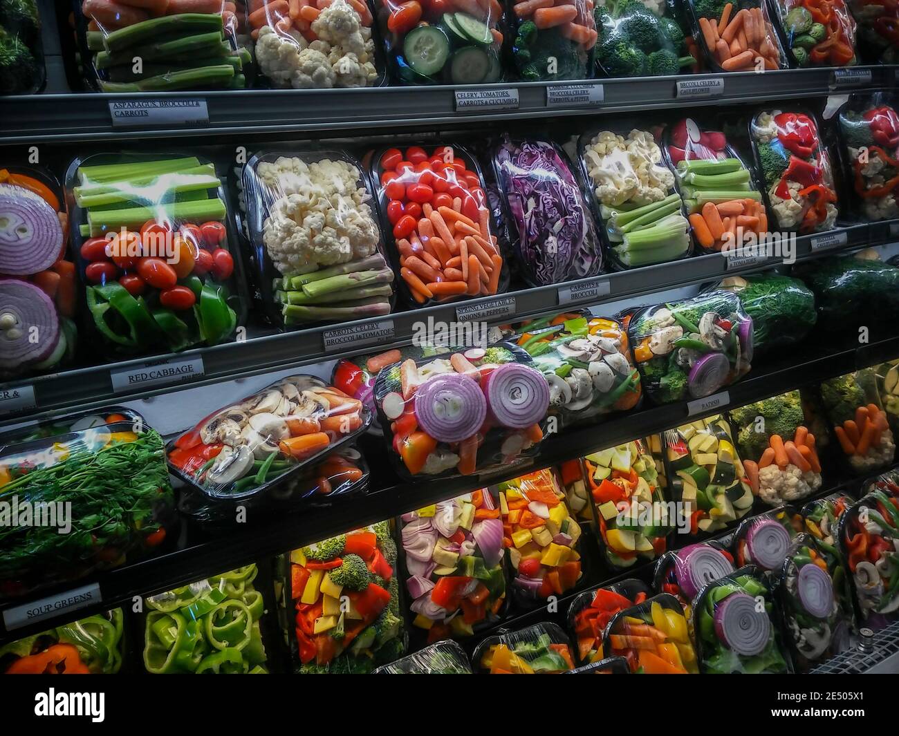 Packages of precut, portioned vegetables in a supermarket in New York