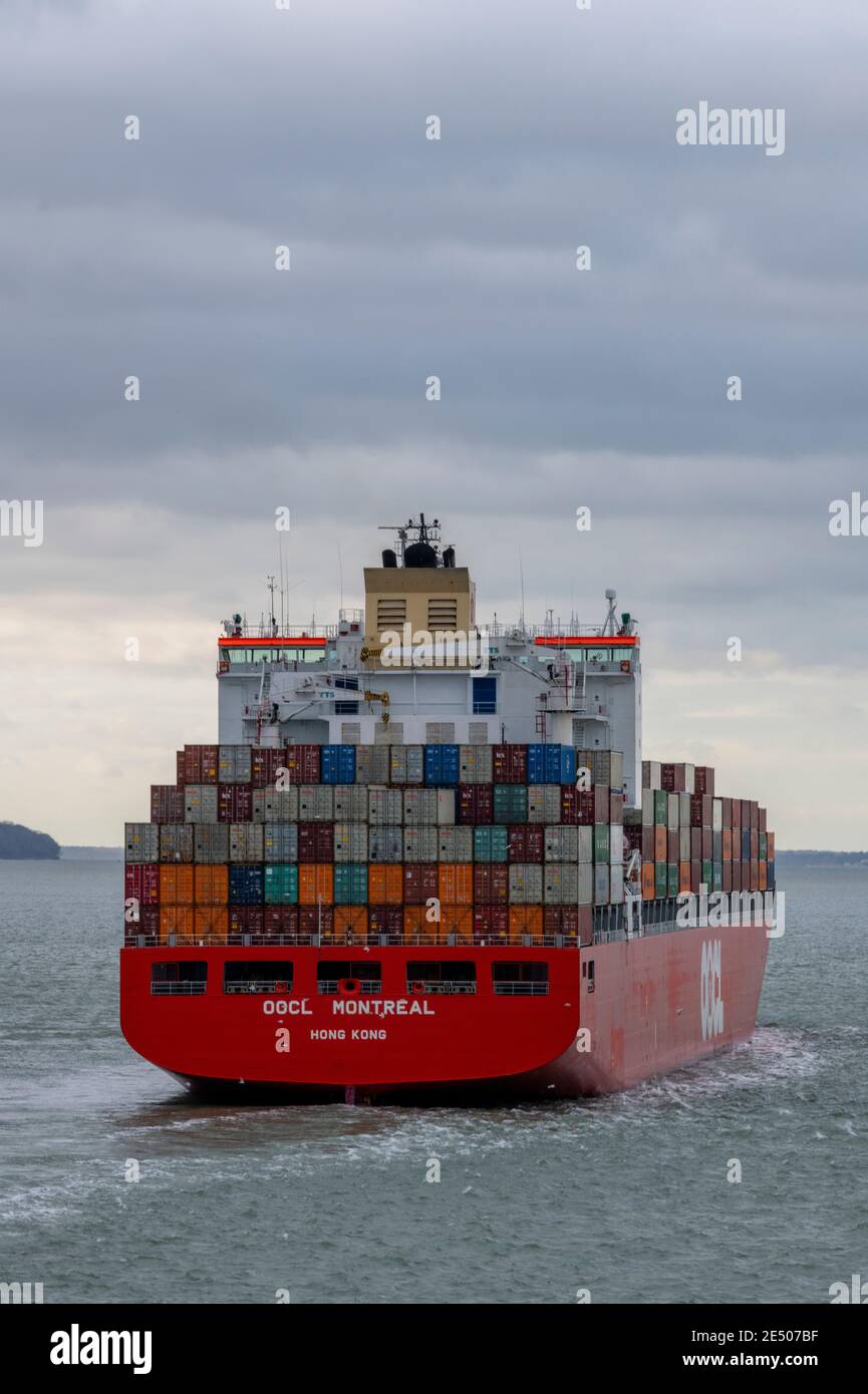 large container ship entering the port of southampton docks in the ...