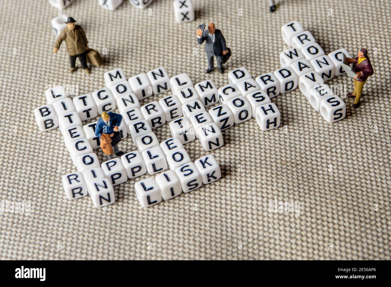 set of popular crypto coins words forming thematical crossword made of  white cubes with black capital letters, bitcoin, altcoins, ethereum,  ripple, lu Stock Photo - Alamy