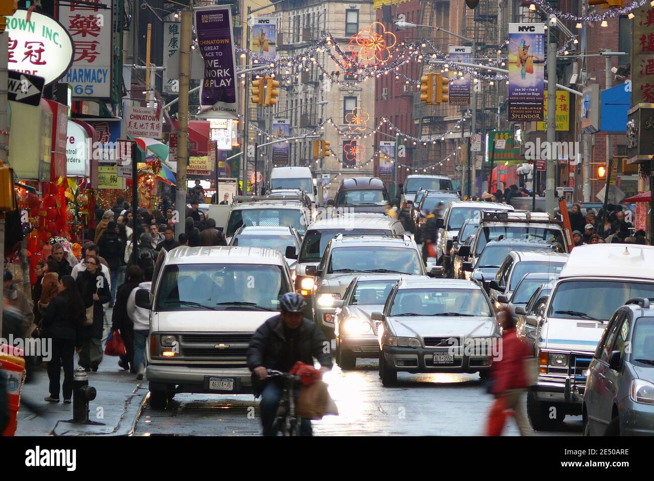 Shoppers and cars jam the colorful Chinatown district in New York City, New York on February 5, 2008. Stock Photo