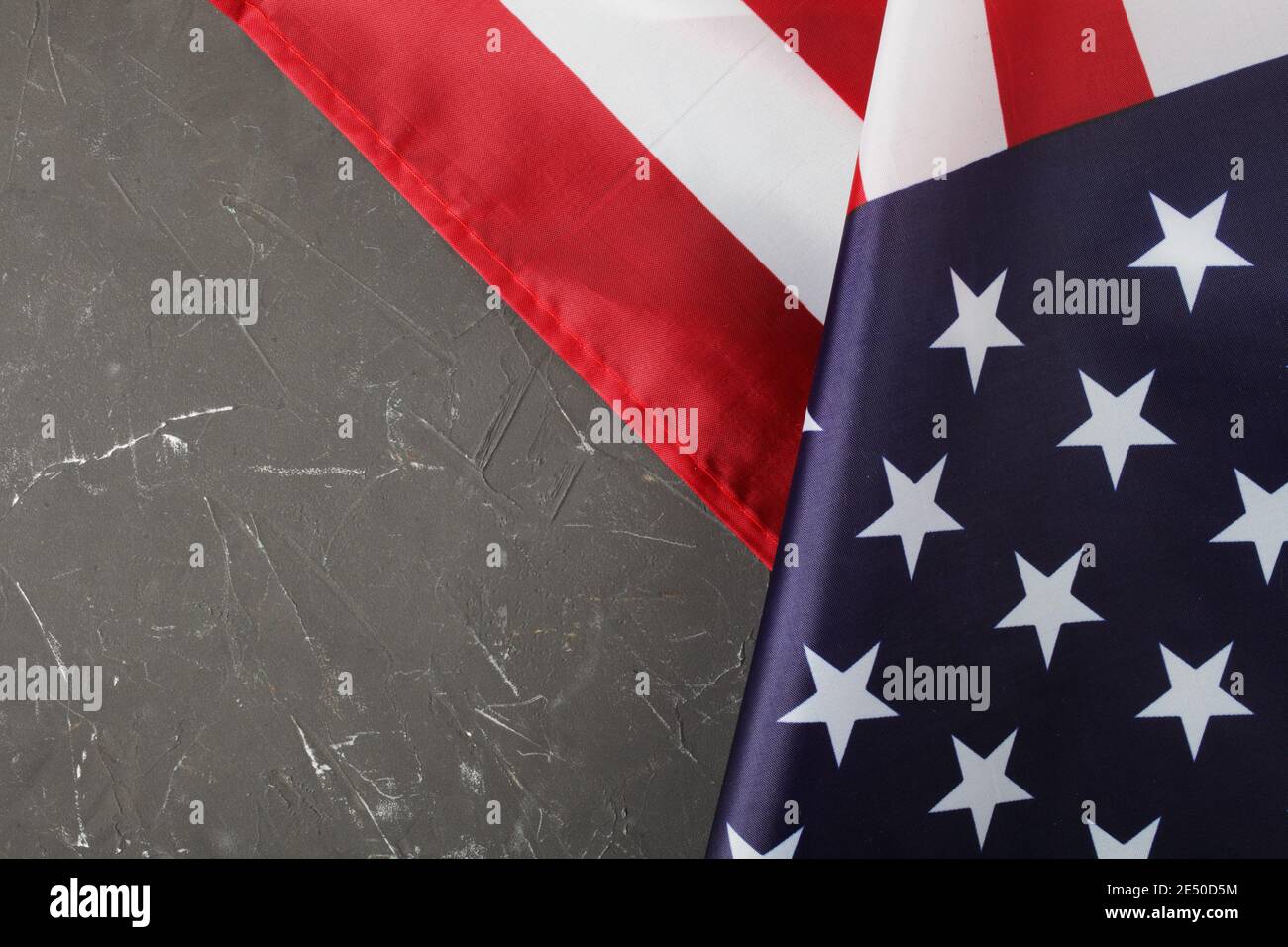 USA flag on a dark concrete background, top view, place for your text. Stock Photo