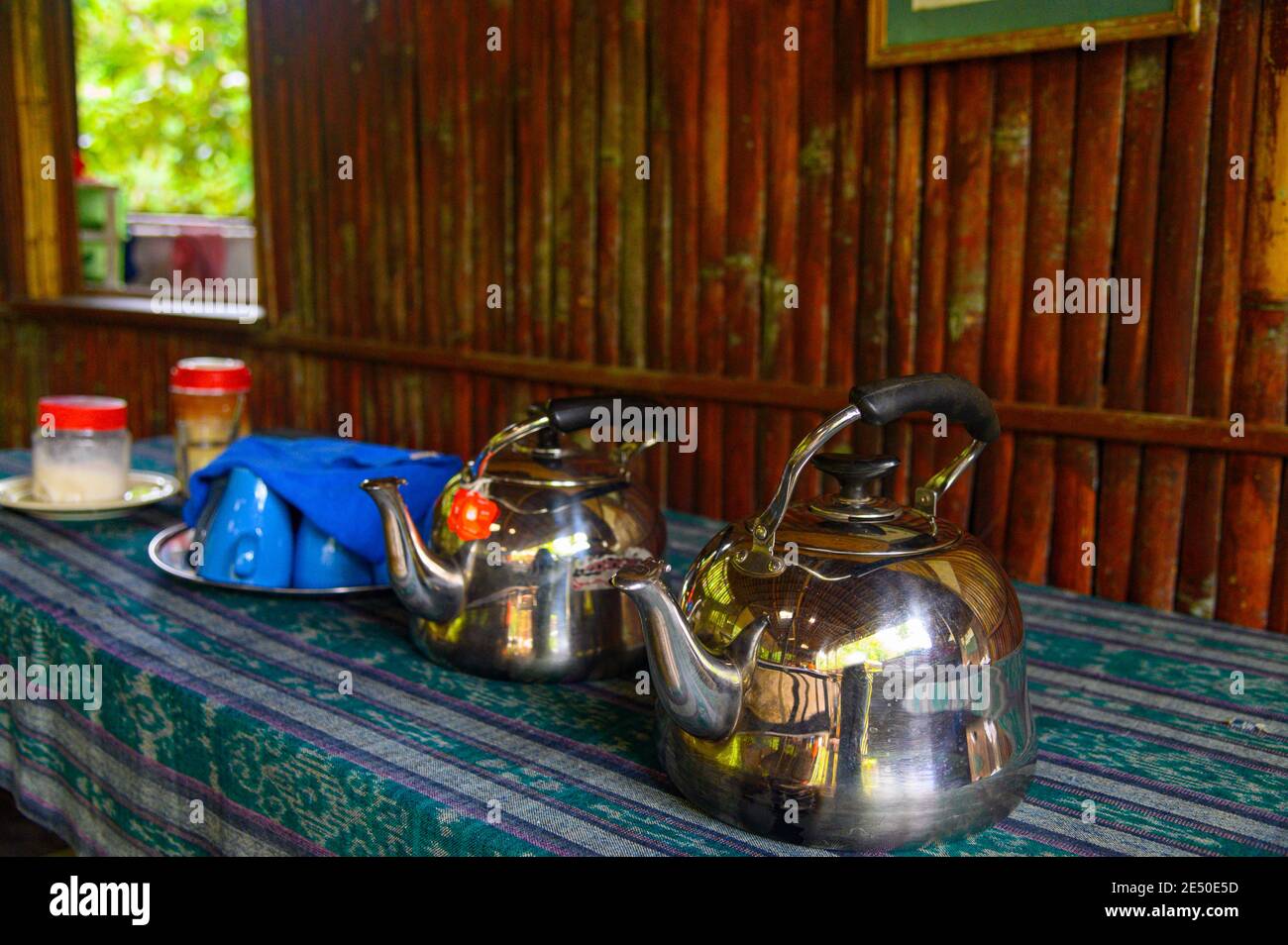 tea pots and cups ready for guests at the Nanga Sumpa Lodge Stock Photo