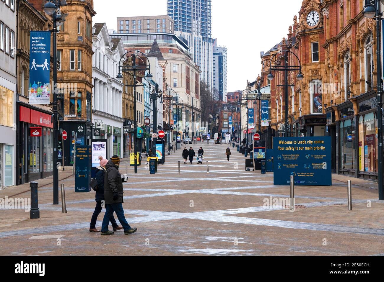UK high street very quiet with lack of shoppers and most shops closed, during lockdown due to Covid 19. January 24th, 2021 in Briggate, Leeds, West Yorkshire Stock Photo