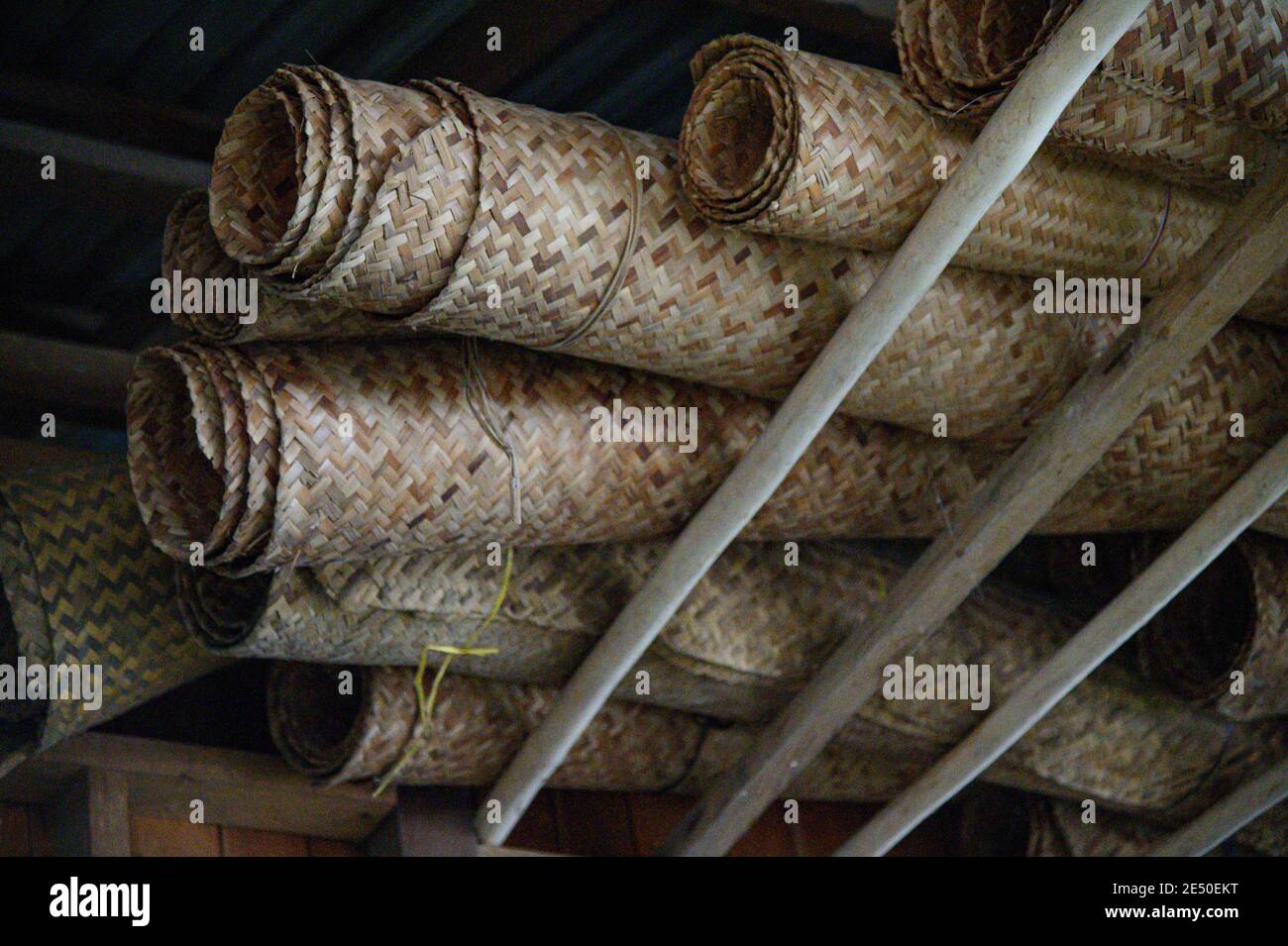 rolled up bamboo mats for storage Stock Photo