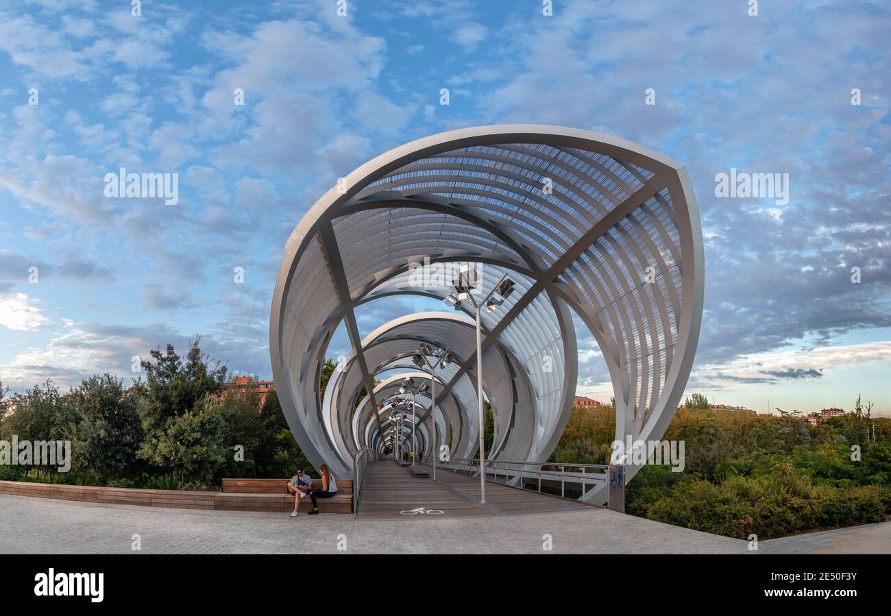 At The Rio Park, a leisure and cultural spot parallel to the River Manzanares, in Madrid, Spain, Europe. The metal tunnel is a popular meeting point. Stock Photo