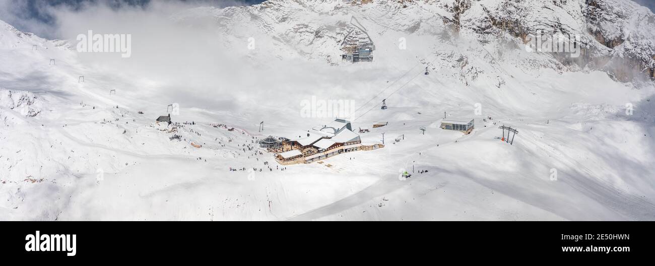 Panoramic aerial view of Sonnalpin restaurant in heavy snow below Zugspitze Top of Germany Stock Photo