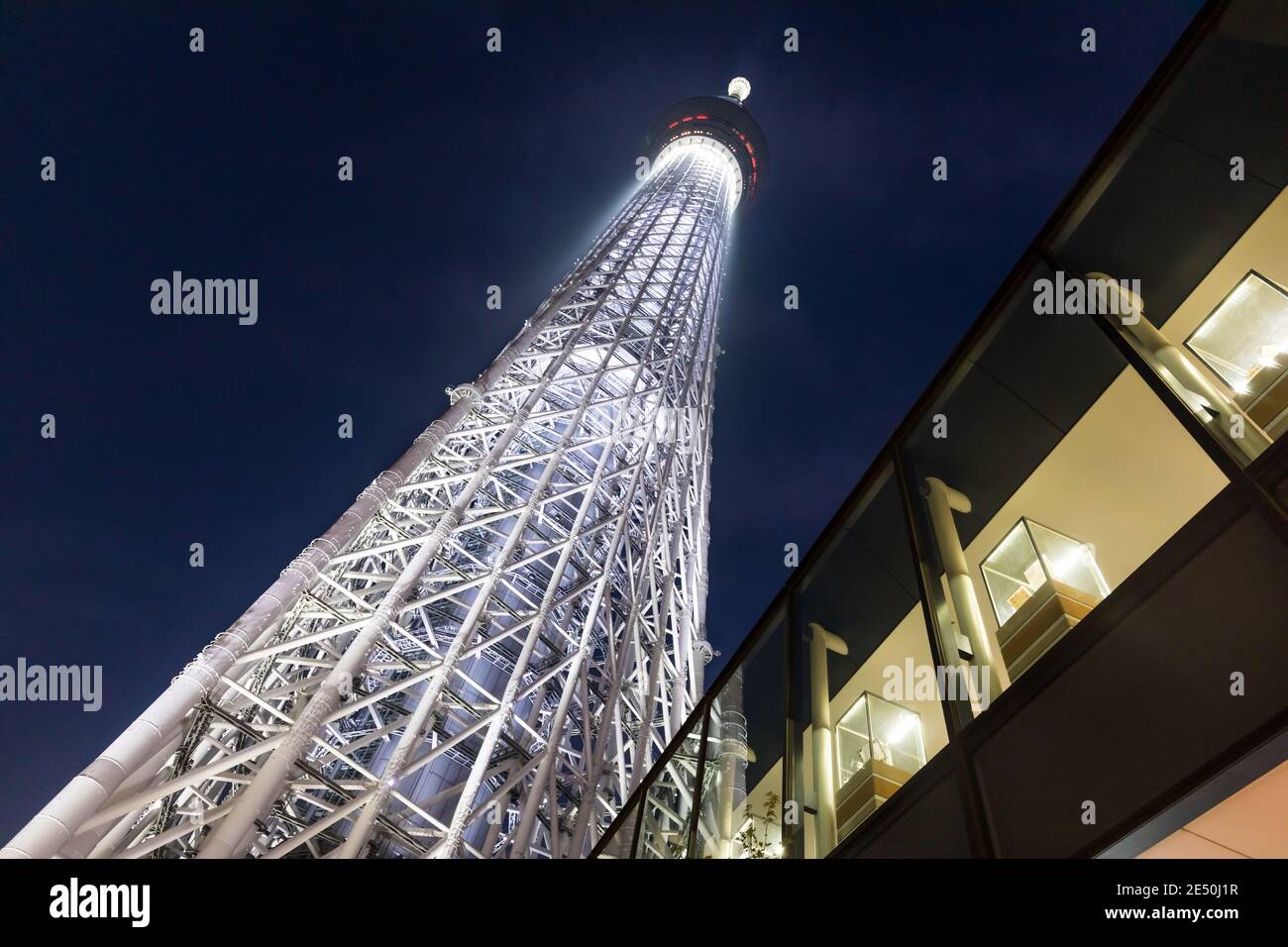 Wide angle view from below of the Tokyo Sky Tree observation tower at night Stock Photo