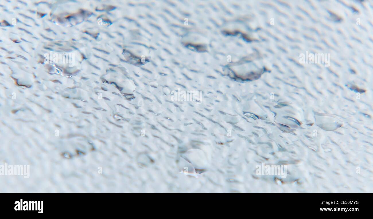 Raindrops on the metal surface Stock Photo