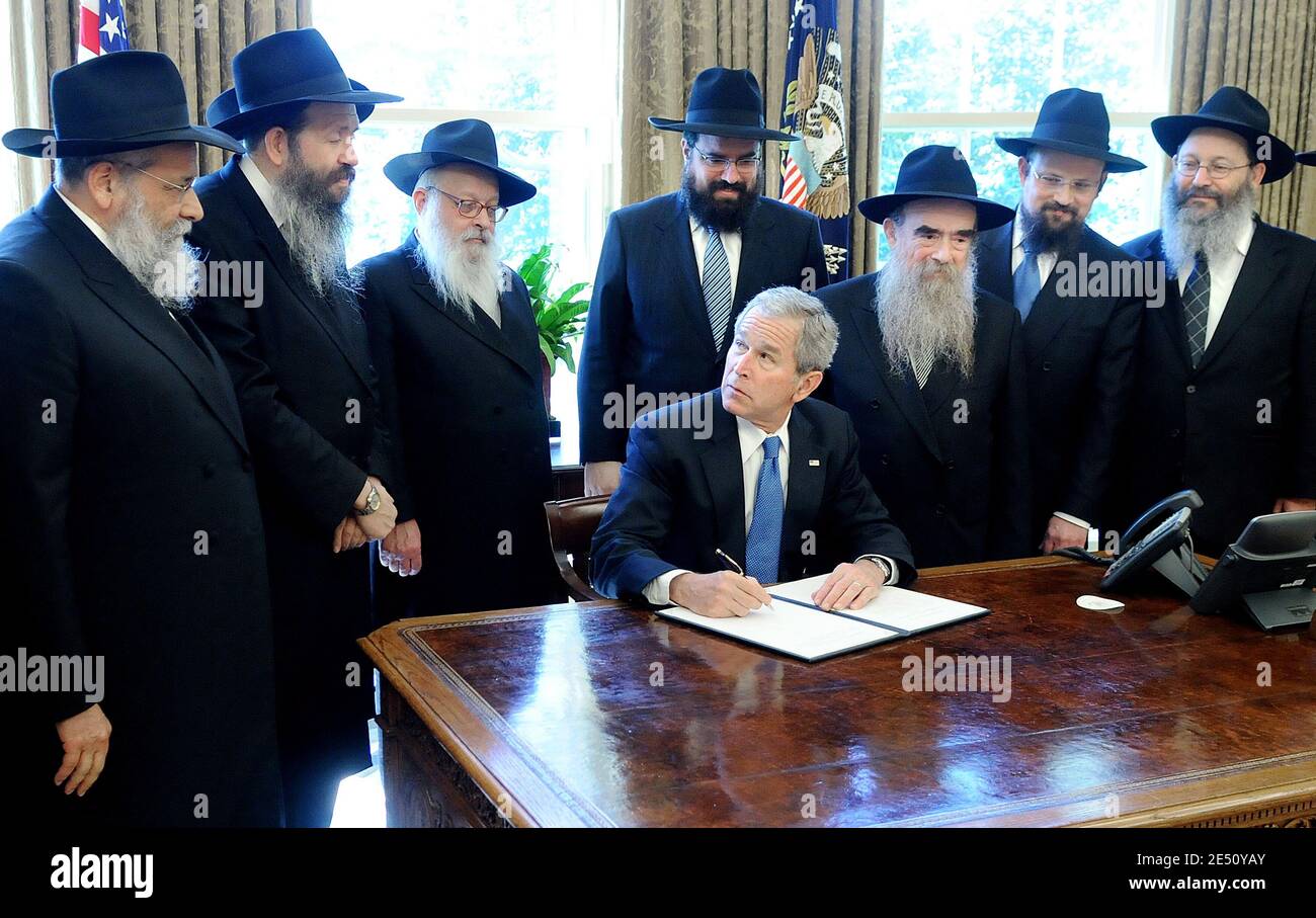 U.S President George W. Bush (C) is surrounded by ten Chabad Rabbis as ...