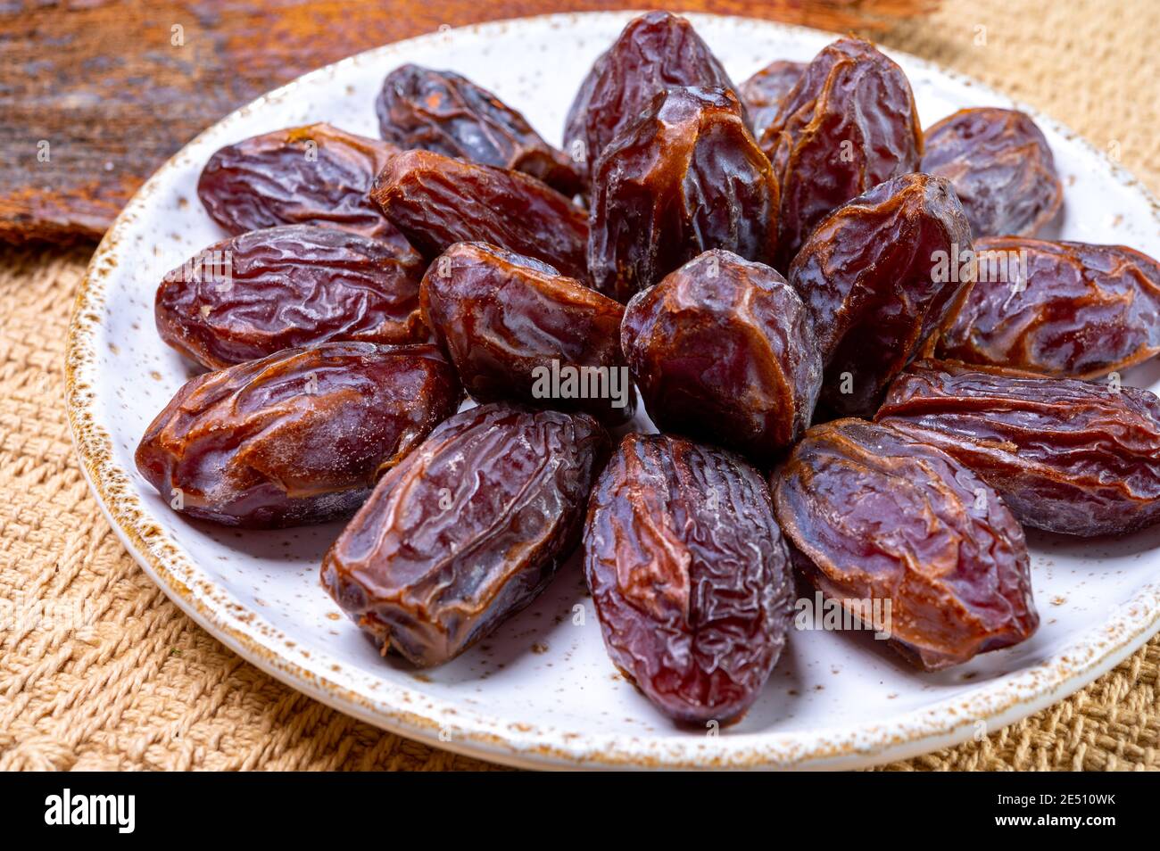 Dried sweet sugar free dates medjoul fruits from Israel close up Stock